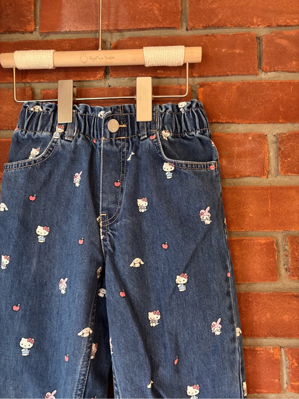H&M Blue Denim Jeans with Pink Hello Kitty Motifs